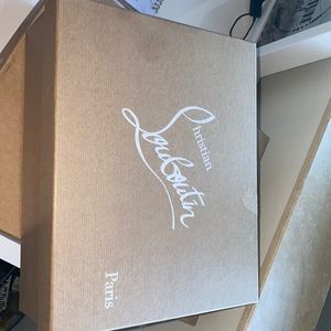 Christian louboutin box with tissue still inside